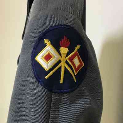 Insignia on left shoulder of Coat (B)