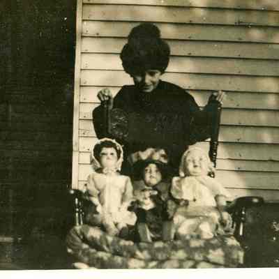 Unidentified Girl w/ Dolls