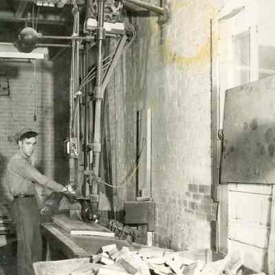 Male worker, unidentified, in an unidentified factory environment