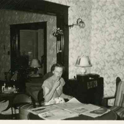 Unidentified Woman Reading Newspaper
