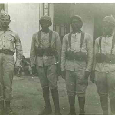Unknown Soldier with Local Men