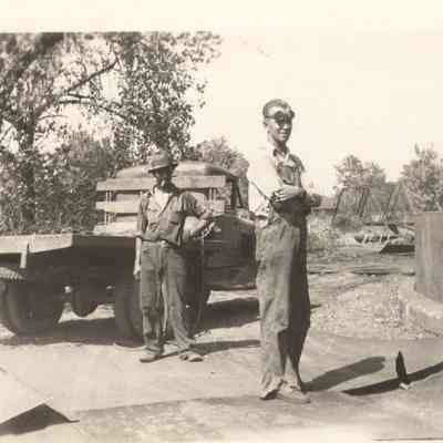 2 unidentified workmen