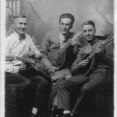 Young men with musical instruments