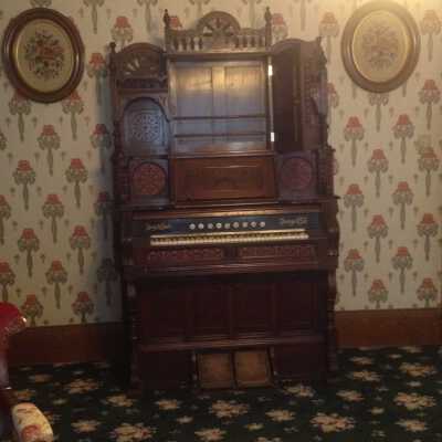 Organ with cabinet door open