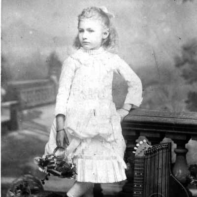 Julia Knauth at 9 years old with the large zither: She was to become Captain Lass' daughter-in-law Julia Knauth Lass.  The photo was taken while the family was living in San Francisco.