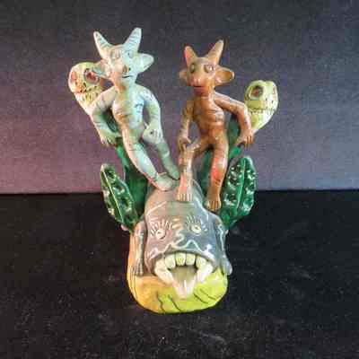 Figure with reptile