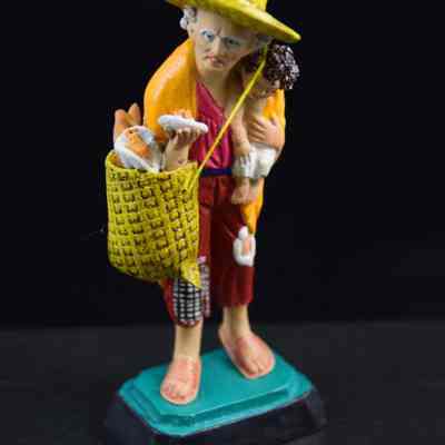 "Man with bread basket and child"