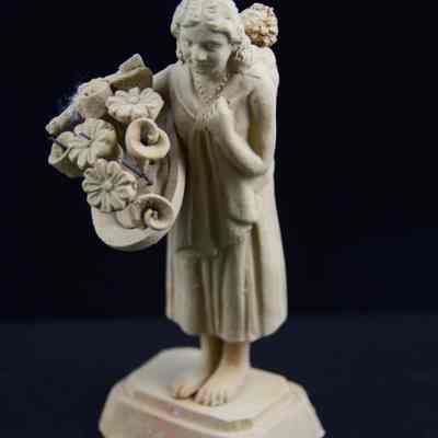 "Woman with flowers and child"