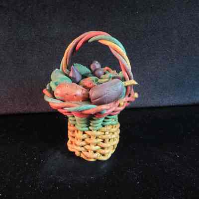 Basket of fruit figurine