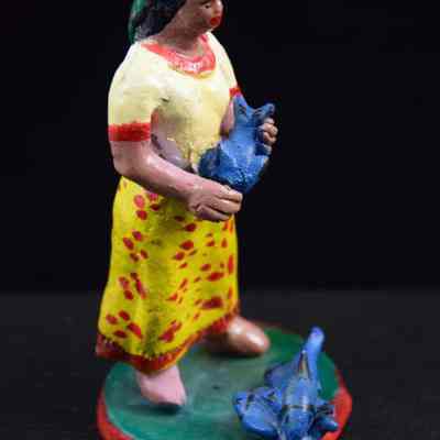 "Woman with blue fish"