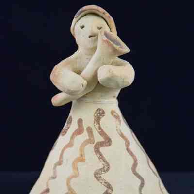 Clay Bell Figure