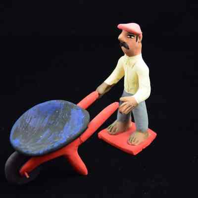 "Man with Wheelbarrow"