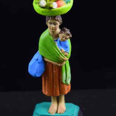 "Woman with child and fruit basket"