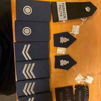 Eleven Dutch Police Insignias