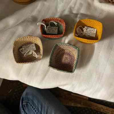 Four Small Coiled Baskets