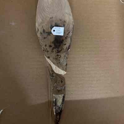 Wood spoon with broken carved handle