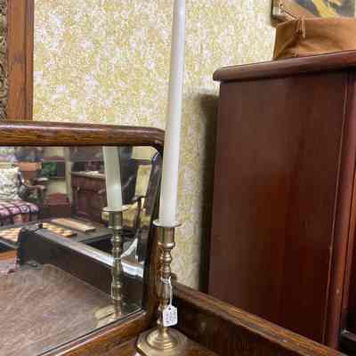 Gold candle stick w/ candle