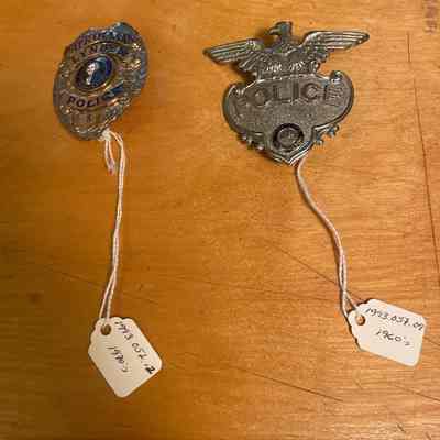 Two Police Badges
