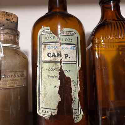 Brown Bottle with Torn Label