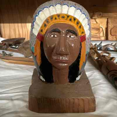 Carved man in headdress