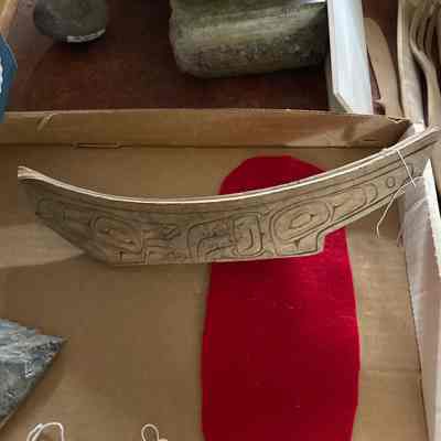 Carved wooden canoe