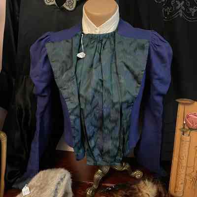Royal blue jacket w/ green collar