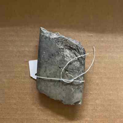 Light gray flat stone tool