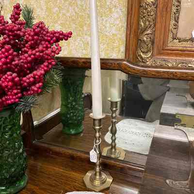 Gold candle stick w/ candle