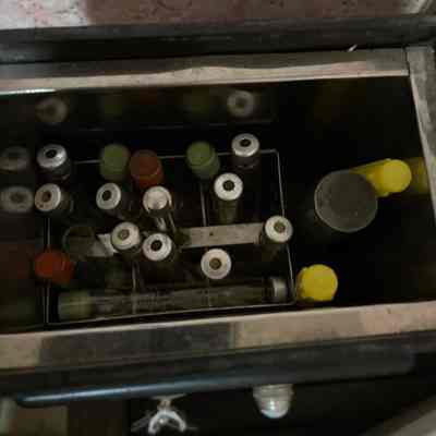 Metal Rack & Vials (Inside Sterilizer)
