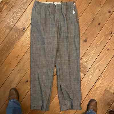 Dark plaid trousers