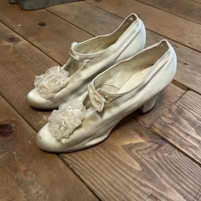 Cream color satin pumps