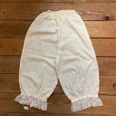 White bloomers w/ pink ribbon