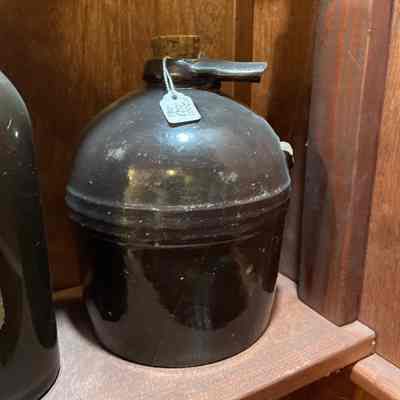 Brown ceramic jug w/ cork
