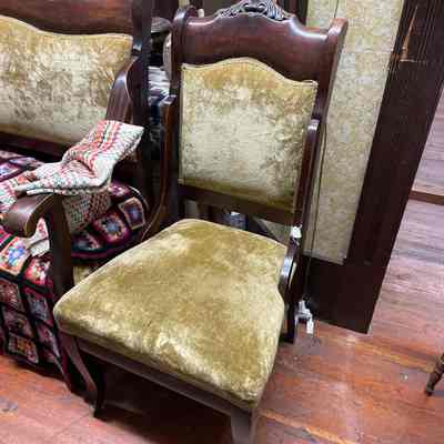 Green velvet dark wood chair