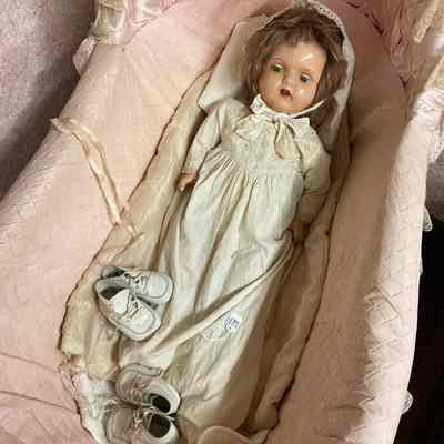 Baby doll in white dress