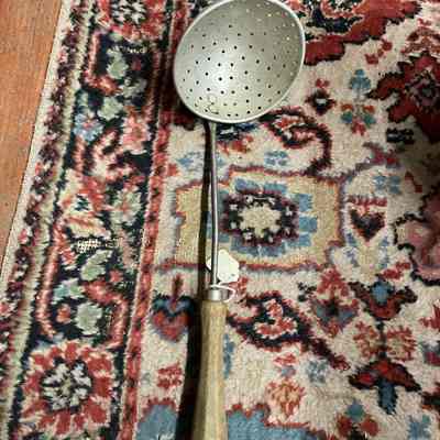 Metal ladel w/ holes