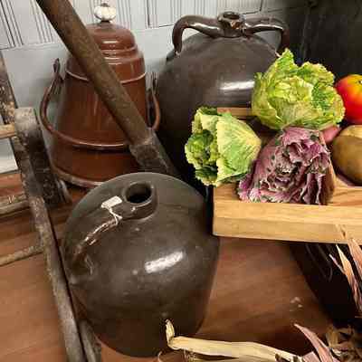 2 large brown jugs