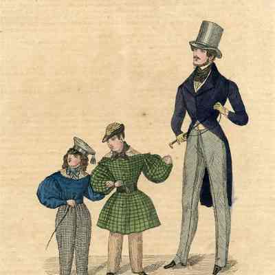 Man, 2 Boys, 1 in Green Frock