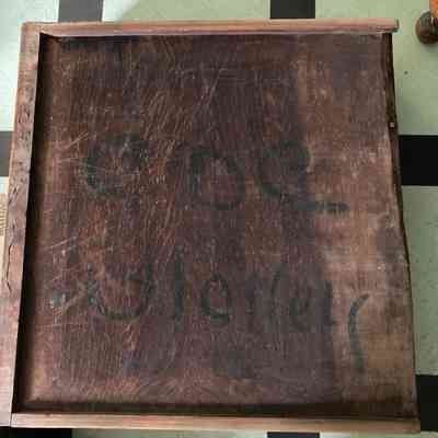 "CDC/ Holley" in black paint on underside of bottom drawer