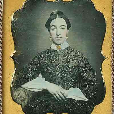 Lady with Fancy Earrings and Print Delaine