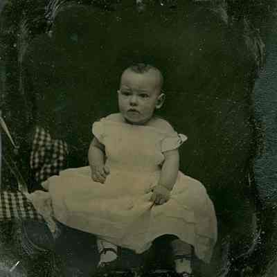 Infant in White Dress and Patent Shoes