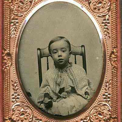 Boy in Knit Cape, Holding Cookie
