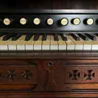 Detail of knobs, keys, and carvings