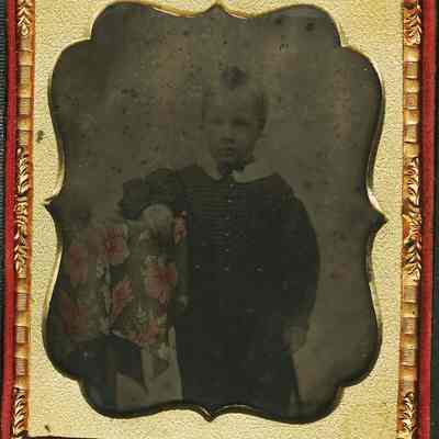 Boy Next to Fancy Tablecloth