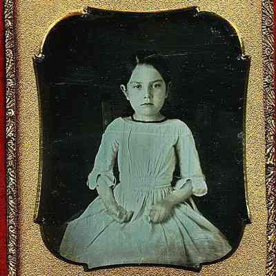 Girl with Double Coral Necklace.
