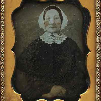 Elderly Lady with Knit Collar