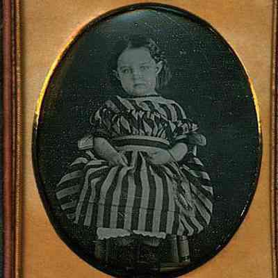 Girl in Wide Striped Dress