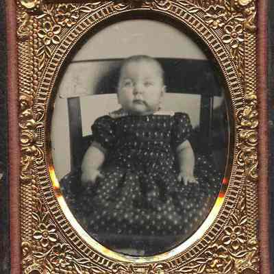 Child in Dark Print Dress