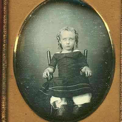 Child with Long Blond Curls.