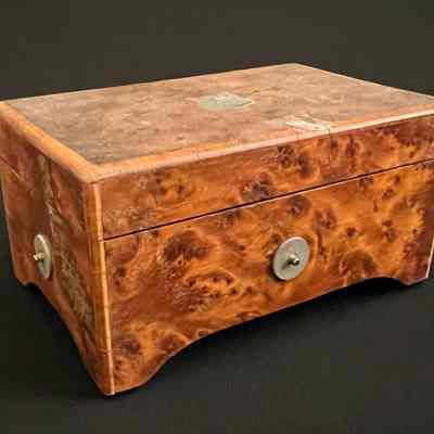 Box closed with pewter disks visible